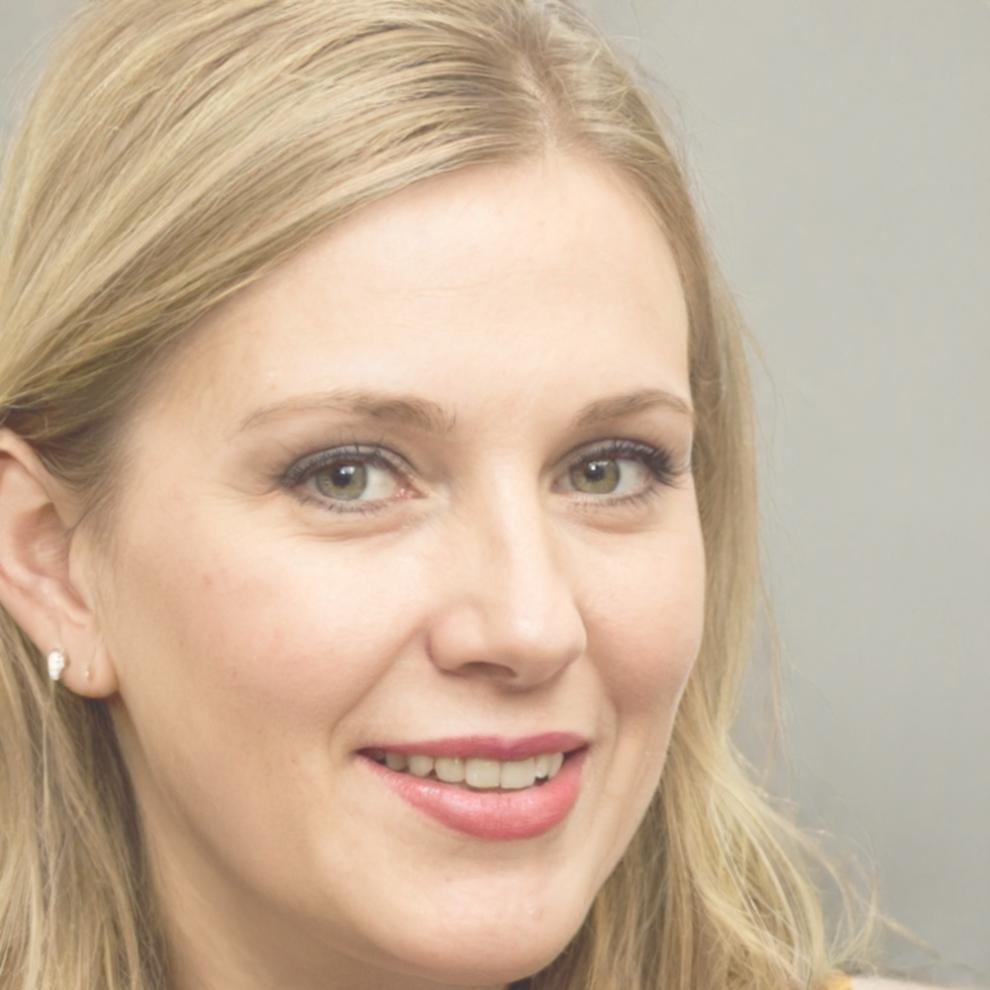 Professional woman in business attire representing sustainable technology leadership